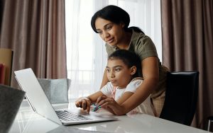 mum and daughter at computer