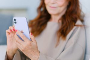 lady holding mobile phone